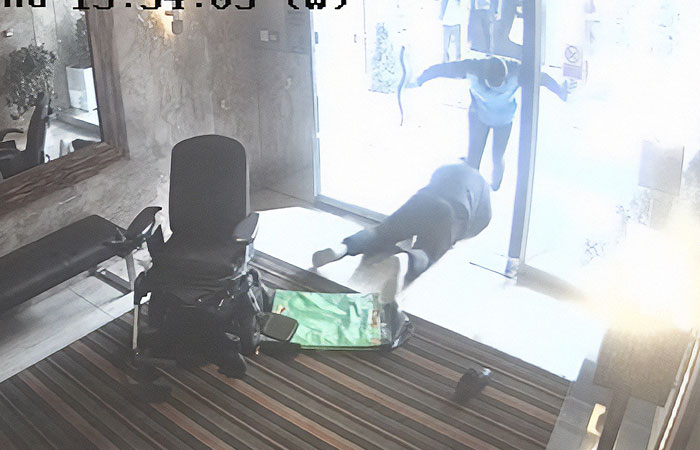 Video Surveillance Captures Violent Fight Between Amazon Delivery Worker And Wheelchair-Bound Man