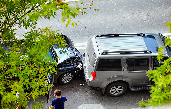 Woman Sues For £650K In Injury Claim, But Insurance Company Finds Photos Of Her Throwing A Tree