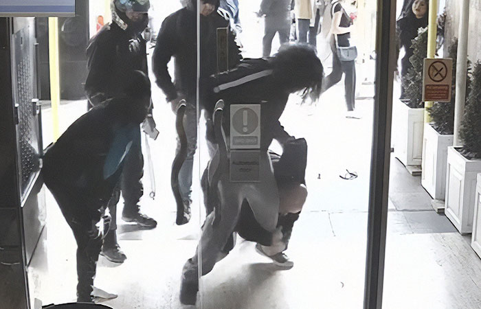 CCTV Captures Violent Altercation Between Amazon Worker And Wheelchair-Bound Man CCTV Captures Violent Altercation Between Amazon Worker And Wheelchair-Bound Man