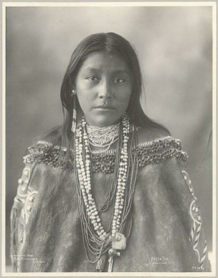 A Studio Portrait Of Hattie Tom, A Young Chiricahua Apache Woman, Photographed At The U.S. Indian Congress Of The Trans-Mississippi And International Exposition In Omaha, 1898