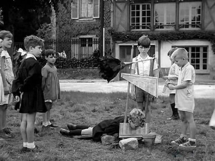 Children Playing With A Toy Guillotine, France, 1959