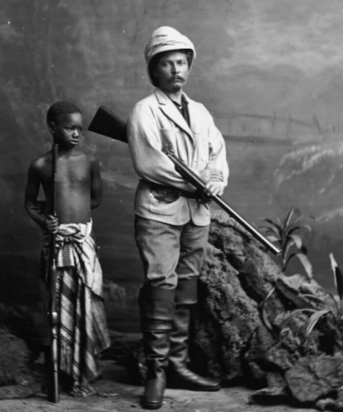 Explorer Henry Morton Stanley And His Adopted Son Kalulu, 1872. Born Ndugu M’hali He Would Only Live For 12 Years But In That Time He Visited Europe, America And The Seychelles. He Had A Book Dedicated To Him, A Model In Madame Tussauds, And Was A Guest At David Livingstone's Funeral