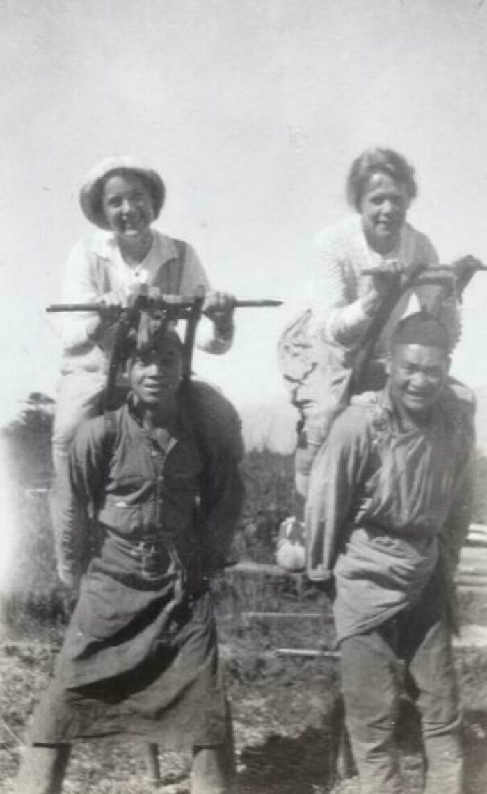 Women Riding Chinese Men Working As Porters, Using A Frame To Mount, Control And Steer Them As A Means Of Transport. The Woman On The Left Is A Canadian, Ethel Vinden Née Dickson With The Protestant Missionary Group China Inland Mission. China, 1920s
