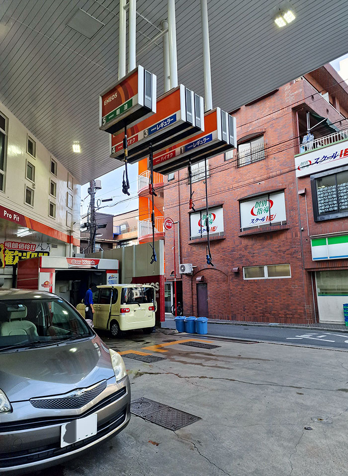 Gas Station In Tokyo. These Fuel Pumps Are From Above