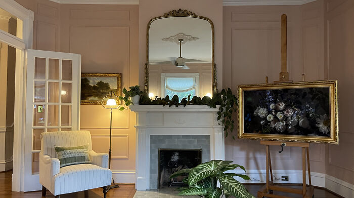 Added Wall Moulding And Mounted The Framed Television On An Easel