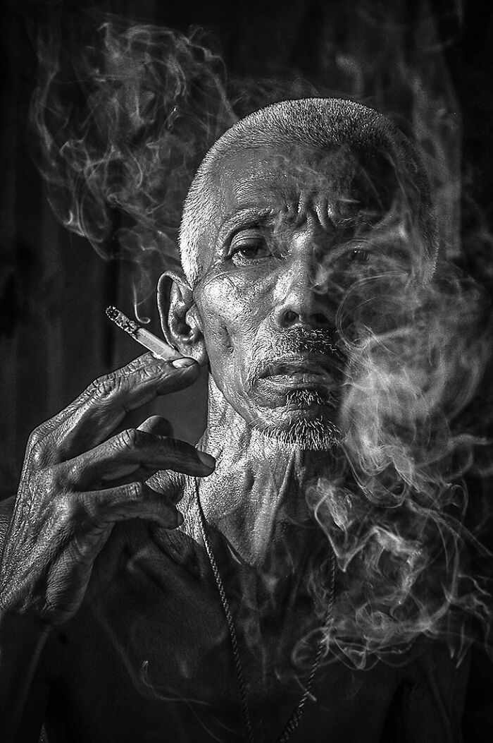 3rd Place In The Portrait Category: "Smoking Man" By Ien Yamasaki, Thailand