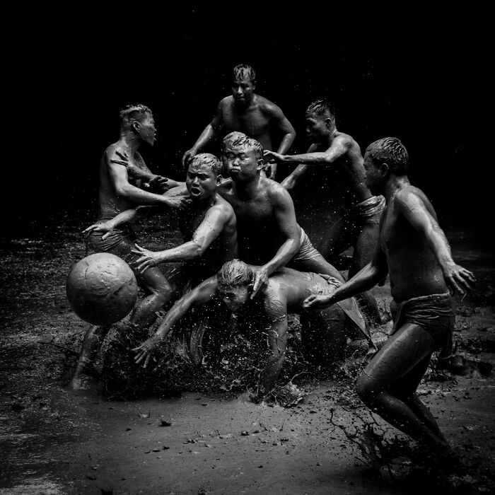 1st Place In The Photojournalism Category: "Mud Ball Wrestling" By Nguyen Dang Giang, Vietnam