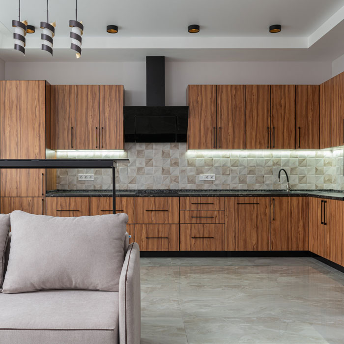 Dark brown kitchen cabinets with patterned tiles