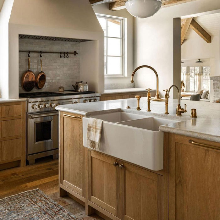 Light brown kitchen cabinets with sink