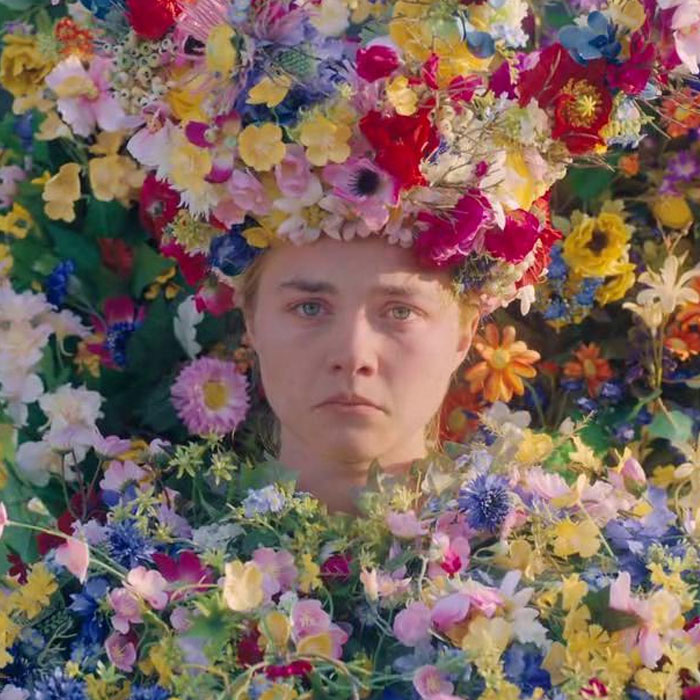Dani with flowers in Midsommar
