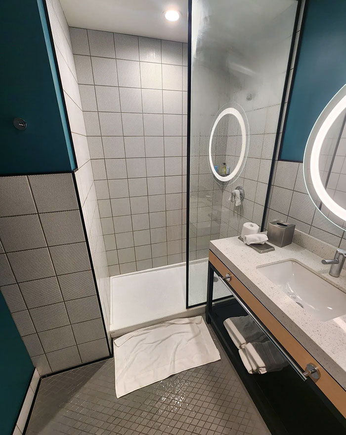 This Shower That Doesn't Have A Door And Gets The Floor Soaked