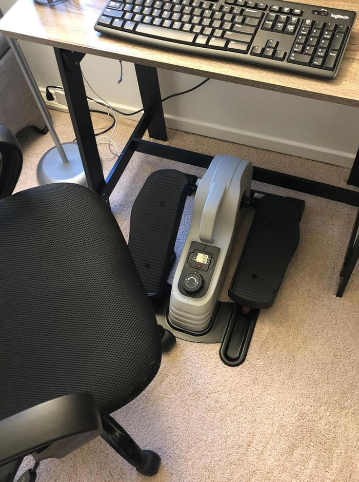  A Sunny Health & Fitness Under Desk Elliptical That's Your Quiet, Low-Impact Desk Mate For Keeping Fit While Working. This Fitness Hack Is A Total Game-Changer!