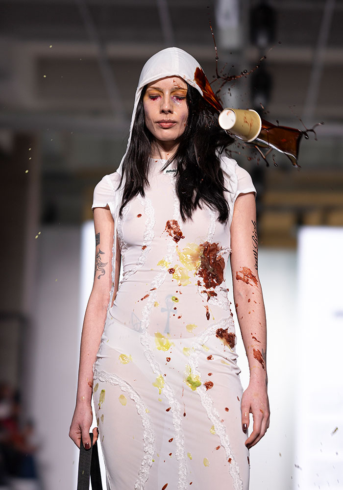 Chaos At Milan Fashion Show As Audience Pelts Models With Discarded Food