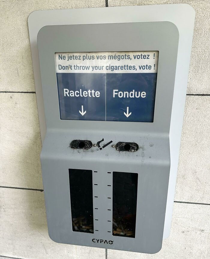 This Cigarette Disposal Asks You To Vote Between Raclette And Fondue - Switzerland's Two Most Famous Cheese Dishes