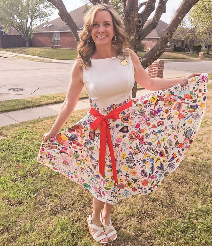 My Mom Is The Cutest Art Teacher Ever! She Made A Dress And Had Everyone Of Her Students Draw One Thing On The Dress For Her To Wear. This Was Her At Her Student's Art Show Tonight