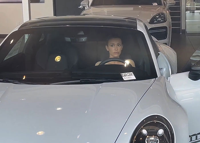 Bianca Censori Goes Porsche Shopping With Kanye West While Wearing An All-Nude Set
