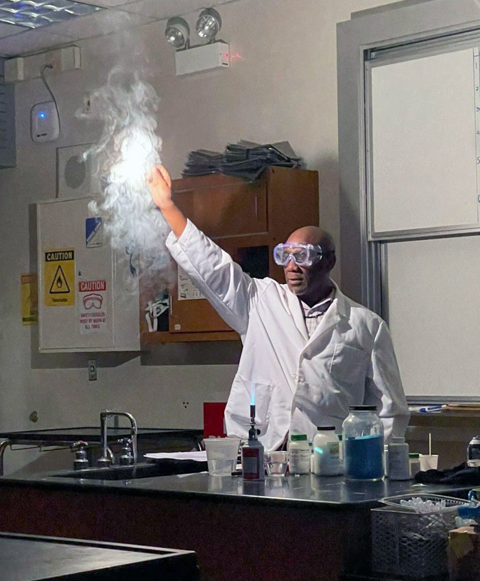 My Science Teacher Hit A Cool Pose While Holding Flaming Magnesium