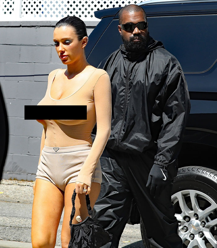 Bianca Censori Goes Porsche Shopping With Kanye West While Wearing An All-Nude Set