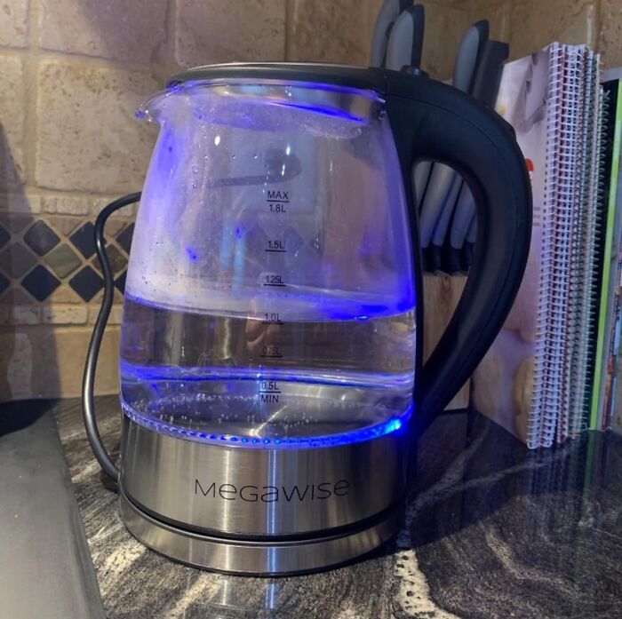 Experience Elegance With The Glass Tea Kettle Featuring LED Light