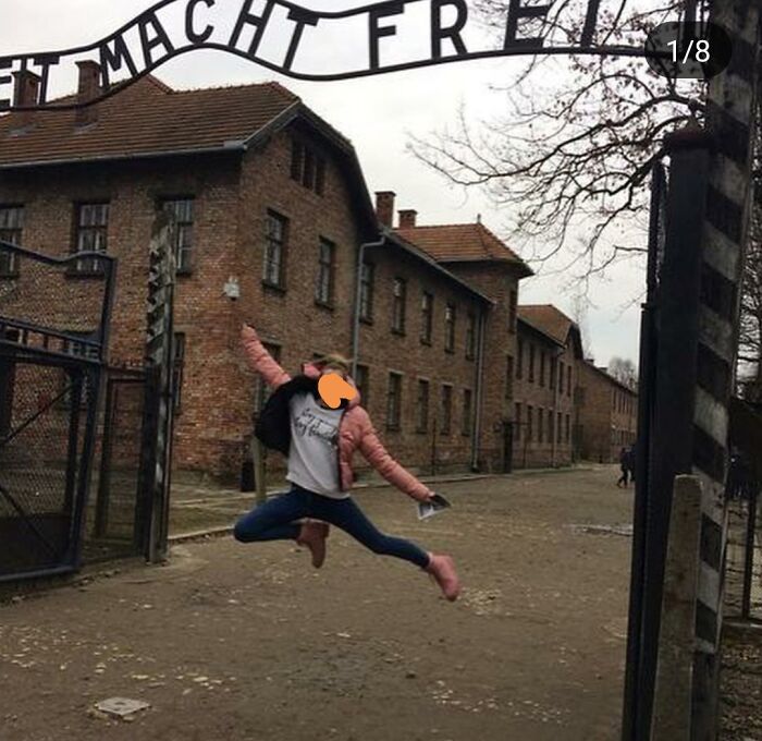 There Are Several Reasons To Visit The Former Auschwitz Concentration Camp, But Goofing Off Really Shouldn't Be One Of Them