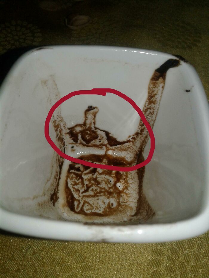 So, Hear Me Out. We Were Reading The Coffee Grounds And This Showed Out In My Cup... Can Anyone See The Lizard With The Superman Costume Or I'm Just Crazy?