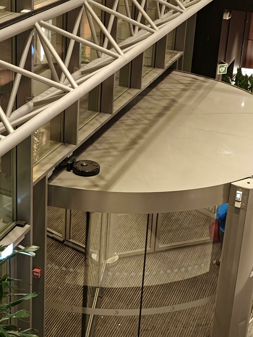 Just Saw This Roomba On Top Of A Norwegian Mall Door