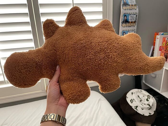 Snuggle Up With Dino Nugget Plush: Enjoy Cuddly Comfort With A Touch Of Prehistoric Charm