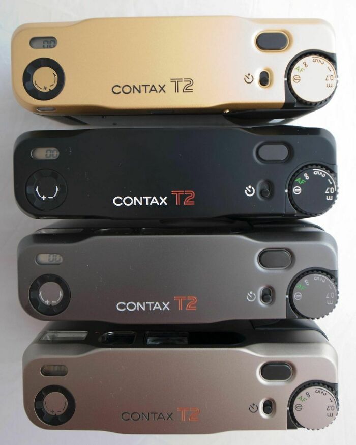 The Contax T2 Released In 1990, Second Of The Contax T Series High-End Compact Film Cameras Offered In Champagne Silver, Black And Gold Plated Finishes