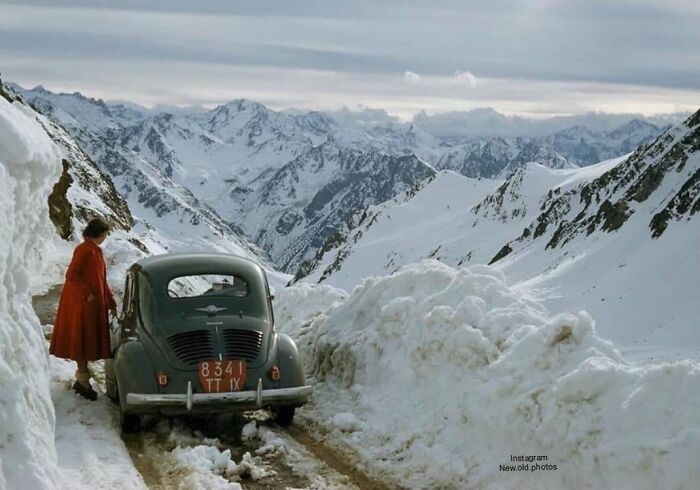 A Woman Overlooking A Snowy Mountain Pass In The Pyrenees Mountains, France - 1956