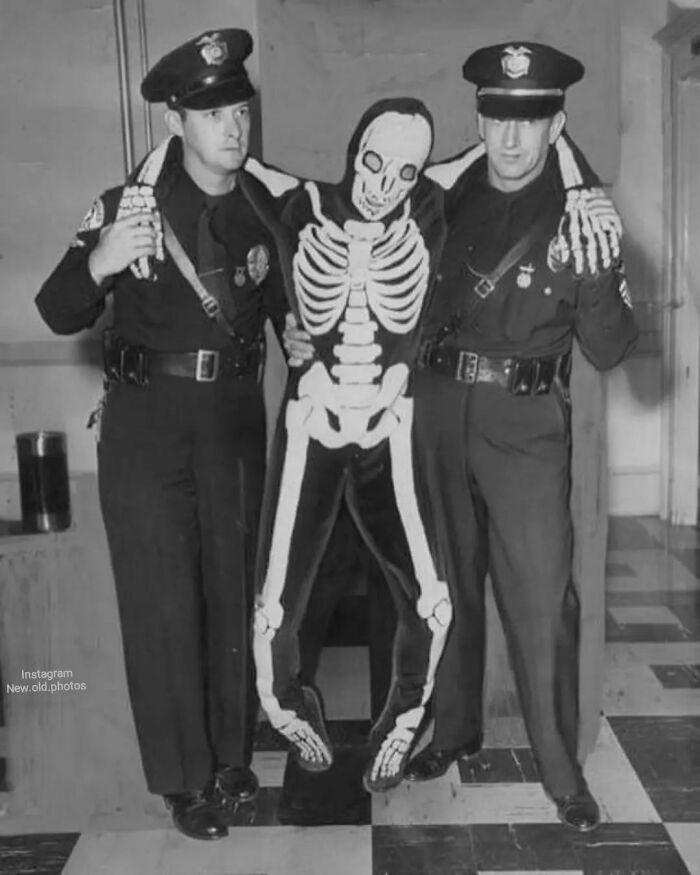 Cops Arresting A Drunk Dude In A Skeleton Costume 1950