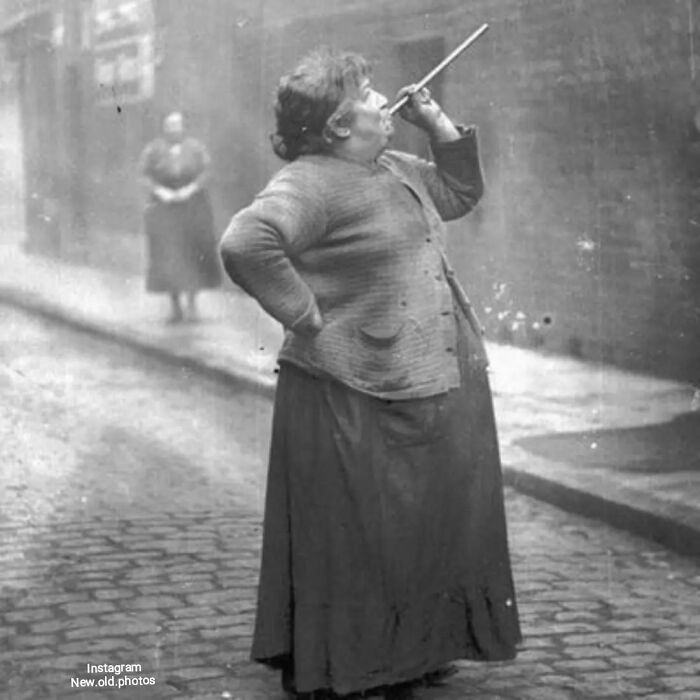 In 1931 , Mary Smith Earned Six Pence A Week In East London By Shooting A Pea Into The Windows Of The Sleeping Workers. Knocker-Uppers Also Used Long Bamboo Sticks, Batons And Canes To Rouse Residents Of The Upper Floors