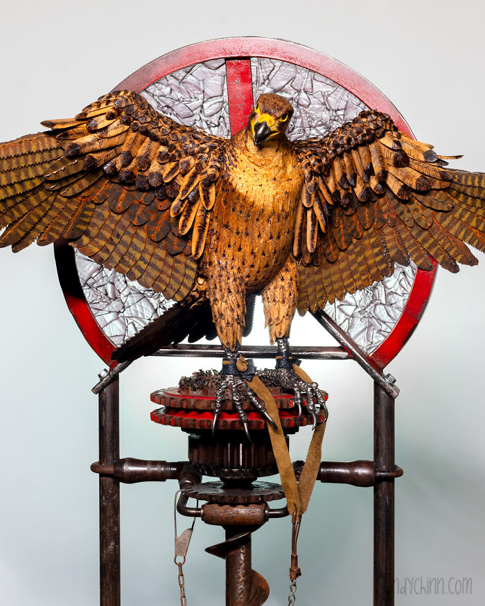 I Made This Falcon From Wood And Scrap Saw Blades! Yard Sale Plates Were Used For The Glass Background, And The Stand Is An Old Farm Tools