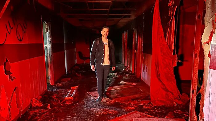 Pablo Cordova Standing In The Once Bussing Hallways Of This Massive Abandoned School In Oklahoma