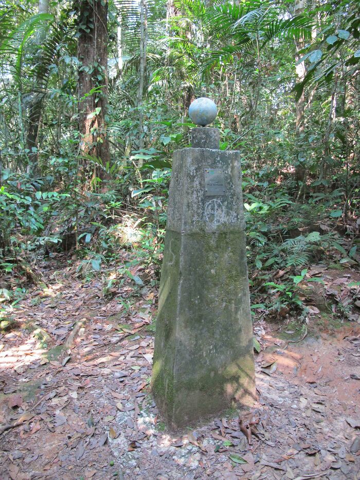 While Hiking An Isolated Jungle Trail In The Amazon, We Came Across This Post Marking The Equator