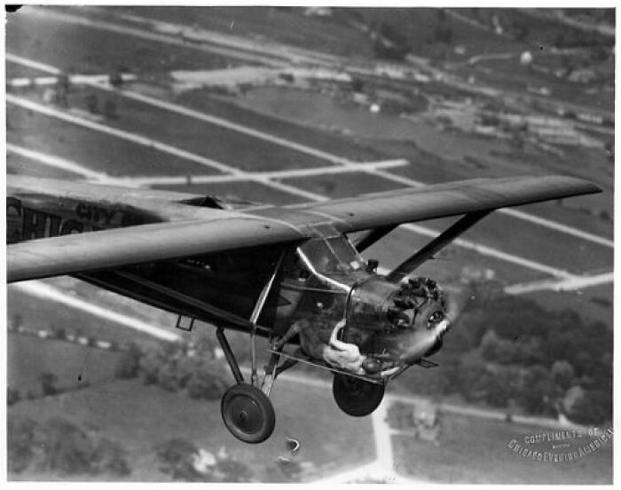 Kenneth Hunter Doing Some Mid-Air Mechanical Checkups During The Hunter Brothers' Record Breaking 23-Day-Long Flight Without Landing