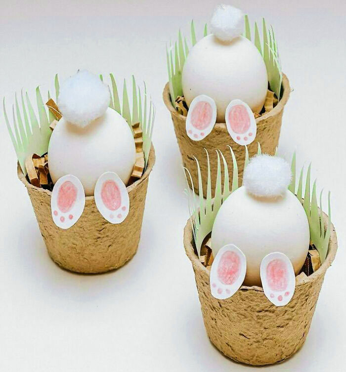 Add Some Grass To Paper Cups And Place Eggs Inside. Pom-Poms And Paper Feet Make It Easy To Turn The Eggs Into Bunnies