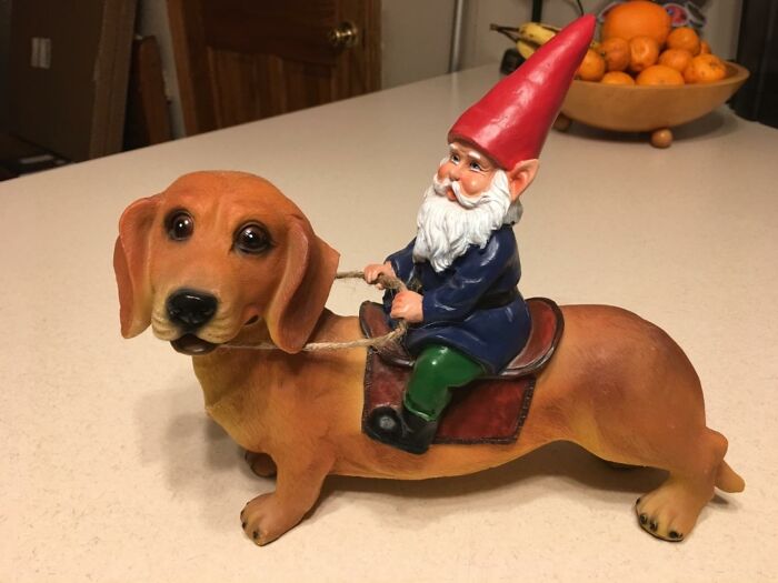 Add Whimsy To Your Garden With The Gnome And Dachshund Garden Statue: A Charming Duo For Your Outdoor Space!