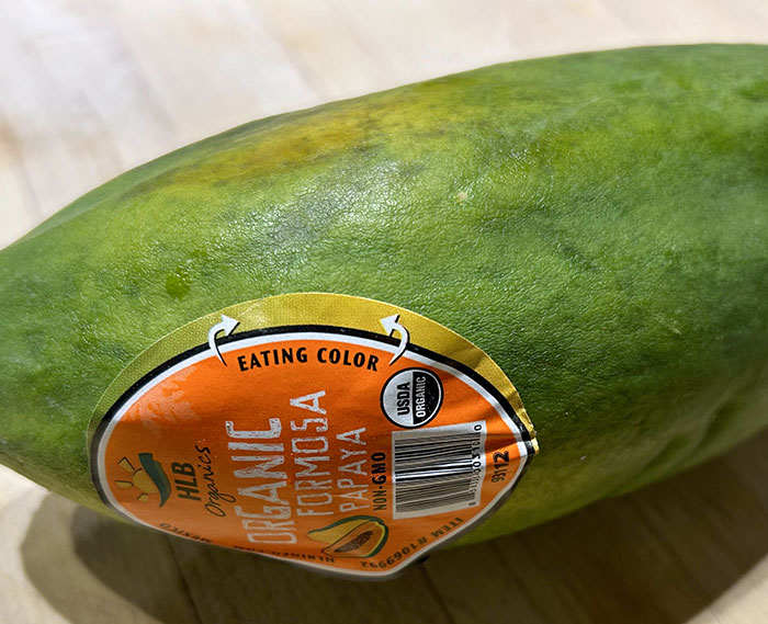 This Papaya Has An "Eating Color" Sticker To Let You Know When It's Ripe