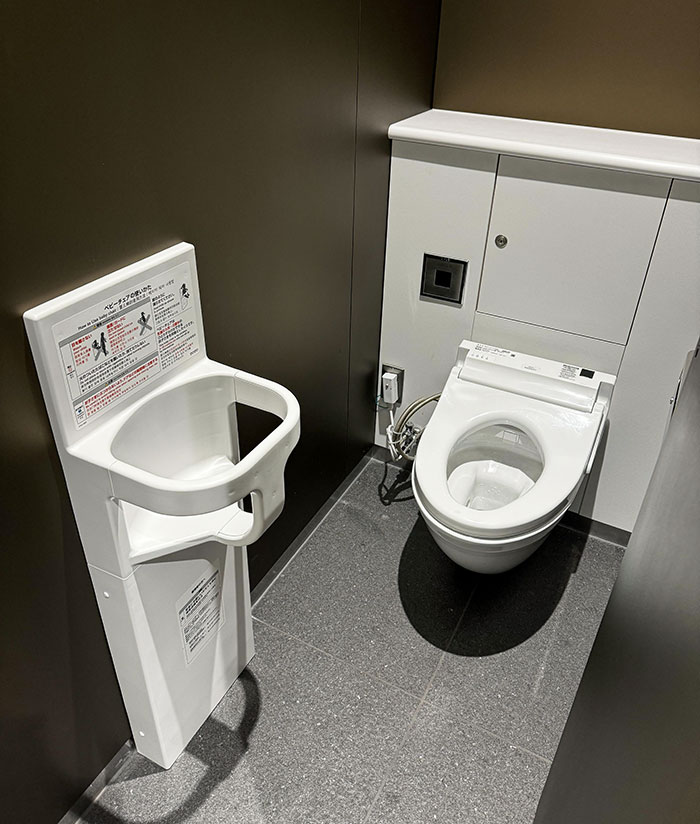 Mall Restroom In Tokyo Has A Holder To Put Your Baby In While You Use The Stall