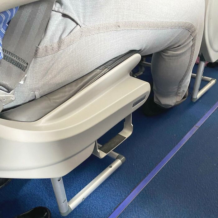 This Airplane Seat Has A Step To Help Short People Reach The Overhead Locker