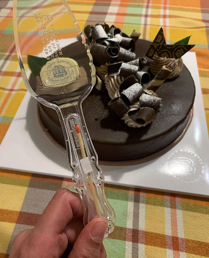 This Cake Cutter Came With A Match To Light The Candles
