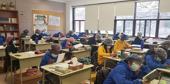 For April Fools, A Teacher Told Her Class That The Government Imposed The Wear Of Shower Caps As Extra Safety Measures