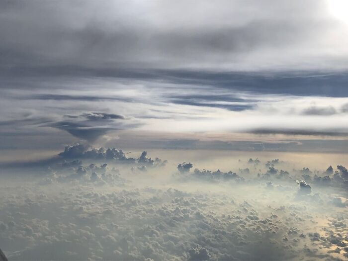 The Clouds Outside My Plane Window Look Like An Alien Landscape