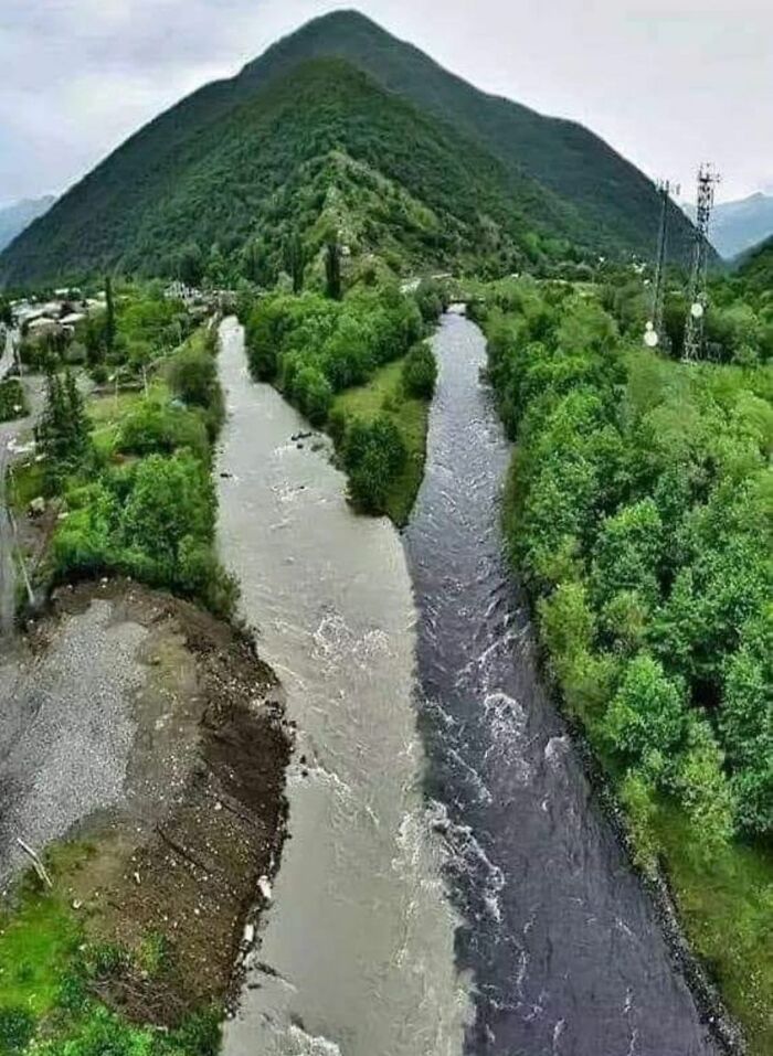A Natural Marvel In The Caucasus, Georgia, Where Two Rivers Converge Yet Remain Distinct Without Mixing