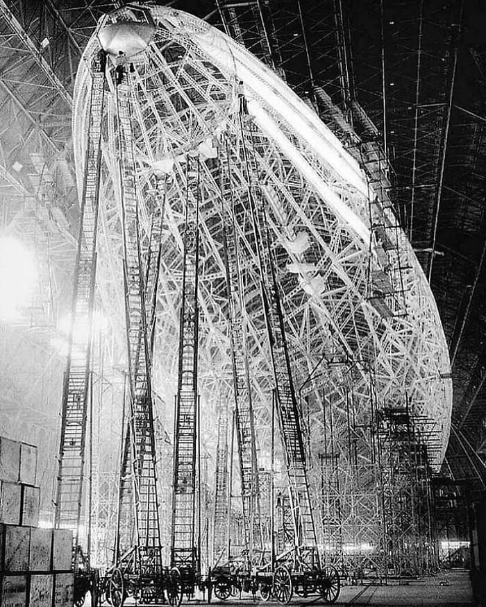 Workers Stand Atop Ladders Working On The Frame Of The Uss Macon Airship. May 1932. Goodyear Airdock, USA. It Launched In April 1933 And Crashed In 1935