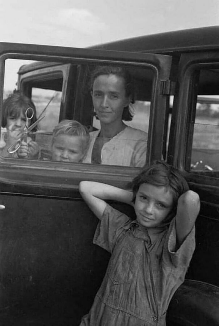 A Family Of A Migratory Fruit Worker From Tennessee Camped In A Field Near The Packinghouse At Winter Haven, Florida, 1937