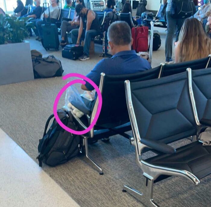Man Snacking On A Bag Of Smelly Hard-Boiled Eggs While I Was Waiting For My Flight