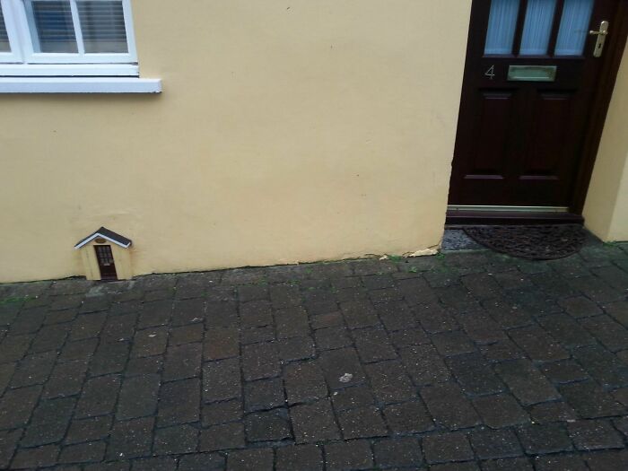 This House Has A Tiny Door Next To The Full Sized Door