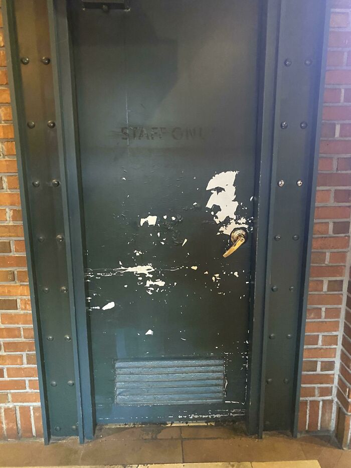 The Peeling On This Staff Entry Door Looks Like Edgar Allen Poe