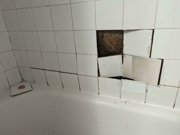 Slipped And Broke The Shower Wall. I Plan On Remodeling In About A Year, Any Temporary Fixes For This Until Then So Moisture Doesn't Get Behind It?